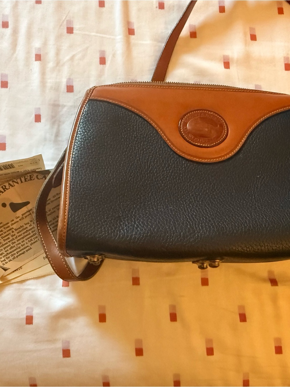 Dooney & Bourke Navy and Tan Leather Messenger Crossbody